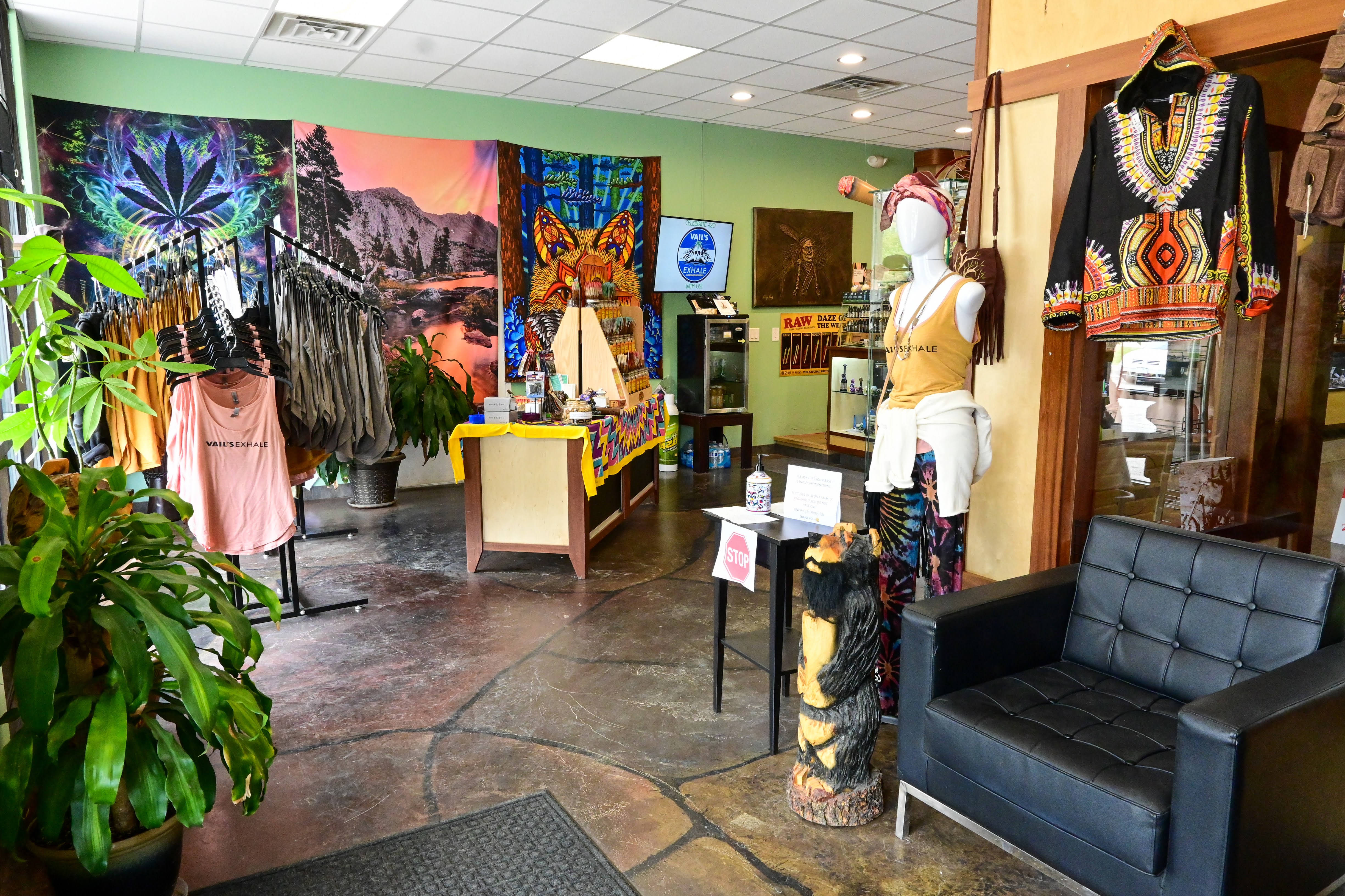 Interior of Vail's Exhale smoke shop featuring glass displays, pipes, and smoking accessories.